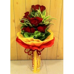 Arrangement of 15 red roses and green fillers